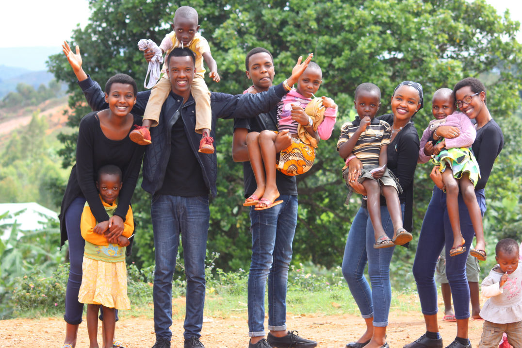 A family in front of their plantation.